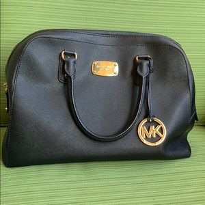 Michael Kors purse, used and in great condition.